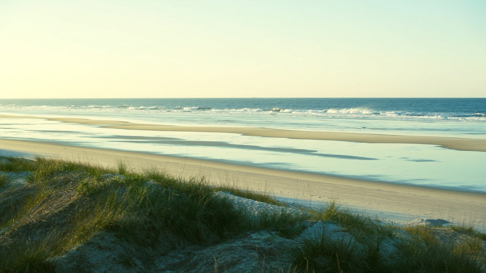 An empty Lowcountry barrier-island beach at low tide